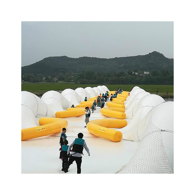 儋州蹦床桥农庄游乐场景区新的项目新款充气蹦床桥制作厂家热门